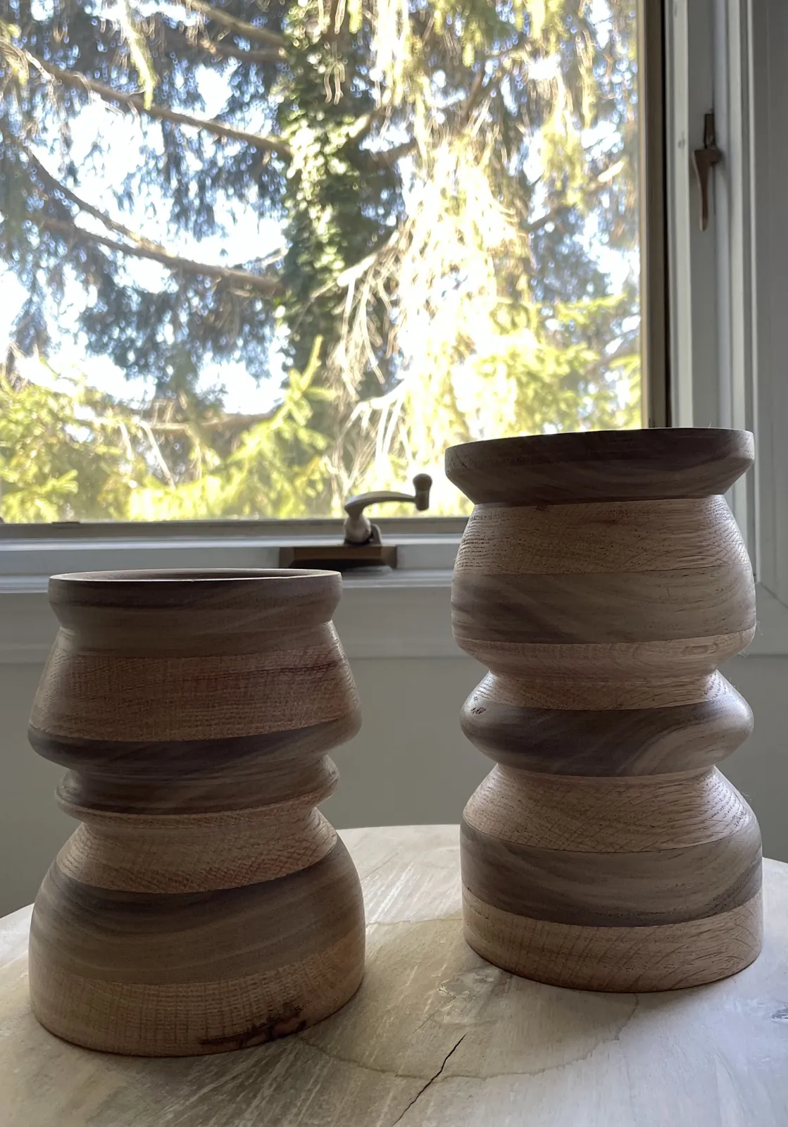 Pair of turned wooden candle holders