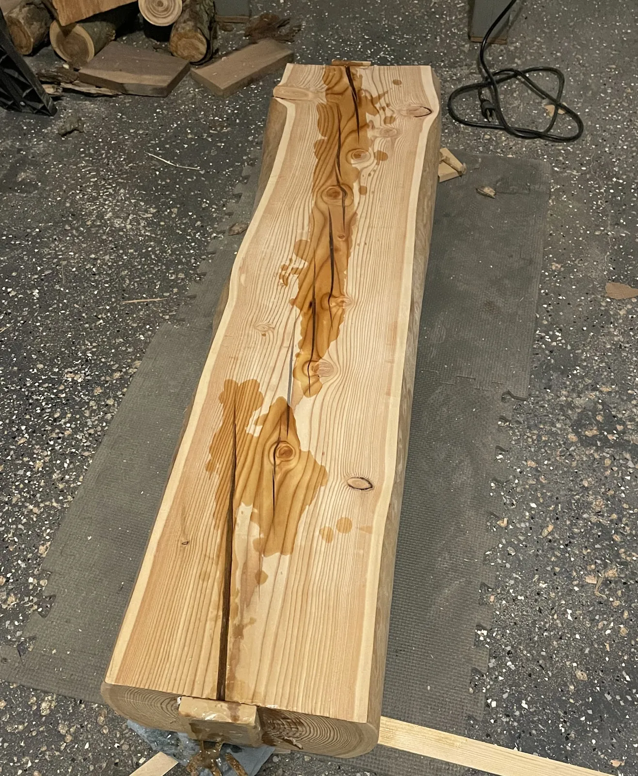 Planed log with epoxy poured into the cracks